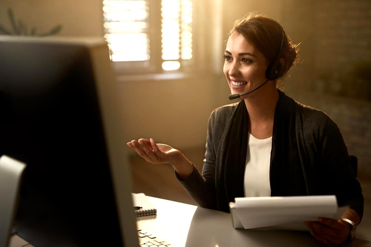 Developer reviewing smart contract code on multiple monitors showing testing results